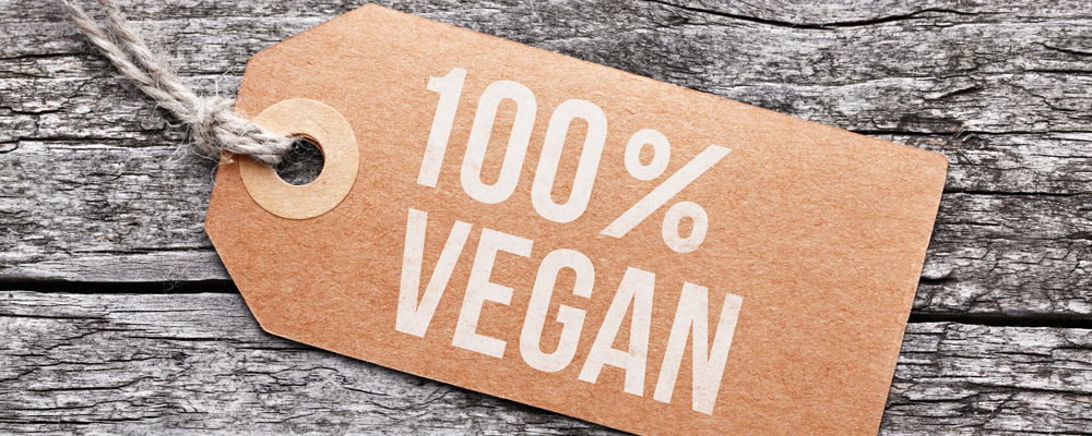Schild mit der Aufschrift 100% Vegan
